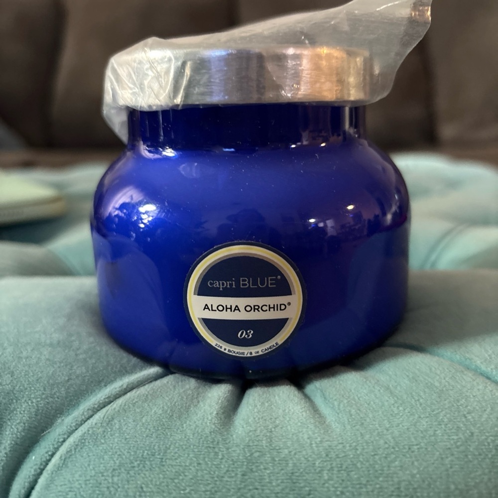 Capri Blue Aloha Orchid Candle in 8oz blue jar